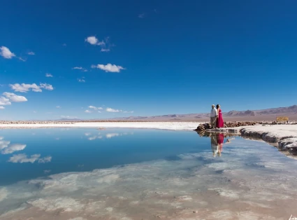 In the foreground Laguna Baltinache, a couple on the right