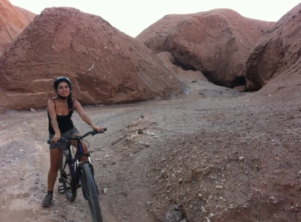 Woman on bicycle in the Garganta del Diablo (Devil's Throat)